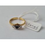 A 3 stone sapphire & diamond ring in 18ct gold - size O - 3gms