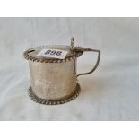 Large circular mustard pot with gadroon edges. London 1908 by H A. 145gms excluding BGL