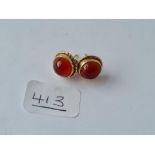 A pair of circular cornelian earrings in 9ct