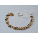 A bracelet with padlock clast in 9ct - 8gms