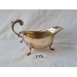 Oval sauce boat with leaf capped handle. Birmingham 1934. 78gms.