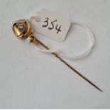 A high carat gold Victorian stick pin with snake motif with diamond tail