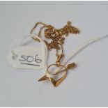 A heart shaped pendant on 9ct chain - 2gms