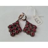 A pair of antique silver ruby & paste drop earrings