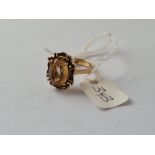 An oblong yellow stone dress ring in 9ct - size M - 4.9gms