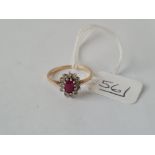 A ruby & diamond cluster ring in 9ct - size M - 1.7gms