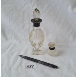 Two mounted bottles with stoppers and a sterling pencil.