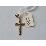 A small 9ct cross - 1.6gms