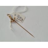 A stone set stick pin in 9ct