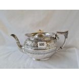 Attractive oval teapot with chased decoration