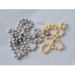 Two row pearl necklaces in bag