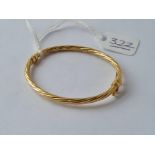 A 9ct bangle - 2.7gms