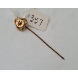 An Edwardian stick pin with rope twist & ruby top in 9ct