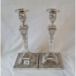 Very fine pair of Adams style candlesticks with decorated rims and detachable nozzles. 12.5 in high.