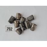 Ten various thimbles. some decorative