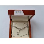 A white gold & diamond leaf style necklaces in 9ct