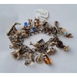 A silver charm bracelet - 91gms