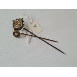 A silver & gold overlay stick pin & 1 other