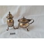Matching mustard pot and pepper on pad feet. London 1920.94gms excluding liner