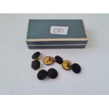 Two pairs of gilt metal black cufflinks boxed