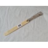 Paper knife with chased decoration. 10in long.