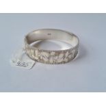 A heavy solid silver decorative bangle - 1976