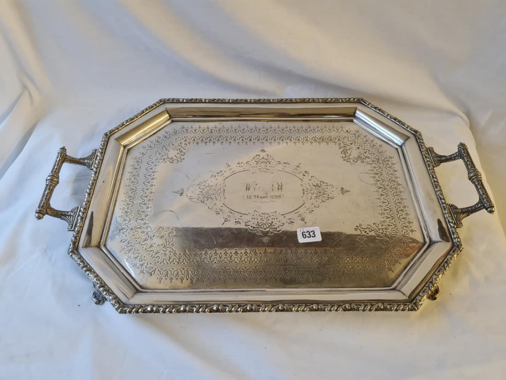 Octagonal two handled tray on four scroll feet 24 inch wide