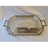 Octagonal two handled tray on four scroll feet 24 inch wide