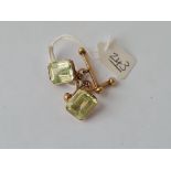 A pair of gold pale stone cufflinks - 8.3gms