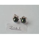 A pair of modern green pearl earrings in 18ct gold - 5.2gms