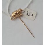 A novelty stick pin of a rat set in gold