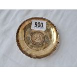 Sterling circular dish inset with Hong Kong Dollar. 3.5in wide. 38gms.