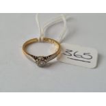 A solitaire diamond ring in 18ct gold - size M - 1.9gms