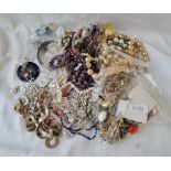 A bag of costume jewellery - 1197gms