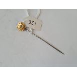 A high carat gold horse shoe topped stickpin set with Lapis & pearl cabochon stones