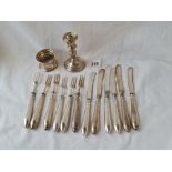 Set of six pairs of fruit eaters with silver handles a napkin ring and a candlestick