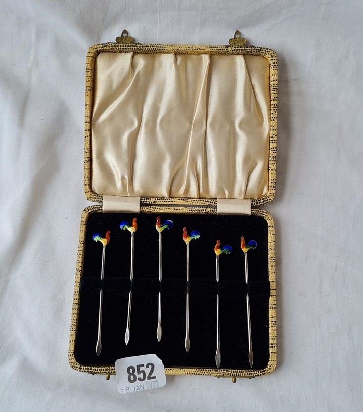 Set of six enamel decorated sterling cocktail sticks in fitted case