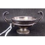 A SMALL SILVER 2 HANDLED CUP - B'HAM 1908