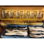 BOXED GRAND NATIONAL DRINKING SET & BOXED HUNTING DRINKING SET, 2 GLASS INK WELLS & 3 BOXED CUTLERY