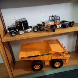 4 SHELVES OF MODEL PLASTIC LORRIES - PLAY WORN