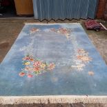 BLUE RUG WITH FLORAL PATTERN 10ft X 7ft A/F