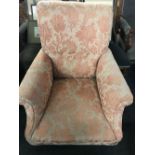 MAHOGANY UPHOLSTERED ARMCHAIR ON CASTERS