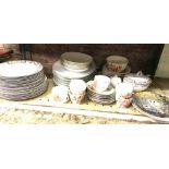 SHELF OF CHINAWARE, PLATES, CUPS, SAUCERS ETC