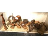 SHELF OF WOODEN CARVED ANIMALS