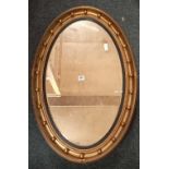 LARGE OVAL GILT FRAMED MIRROR 31''