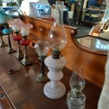 QTY OF OIL LAMPS 5 WITH METAL BASE