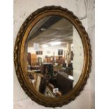 GOLD GILT FRAMED OVAL MIRROR