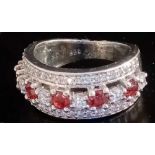 SILVER HALF ETERNITY RING (RED STONES)