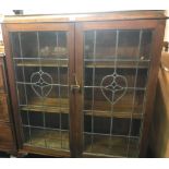 MAHOGANY LEADED GLASS CABINET ON LEGS