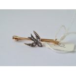 An antique rose diamond swallow brooch mounted in gold
